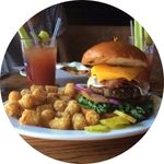 Photo of burger and potato tots